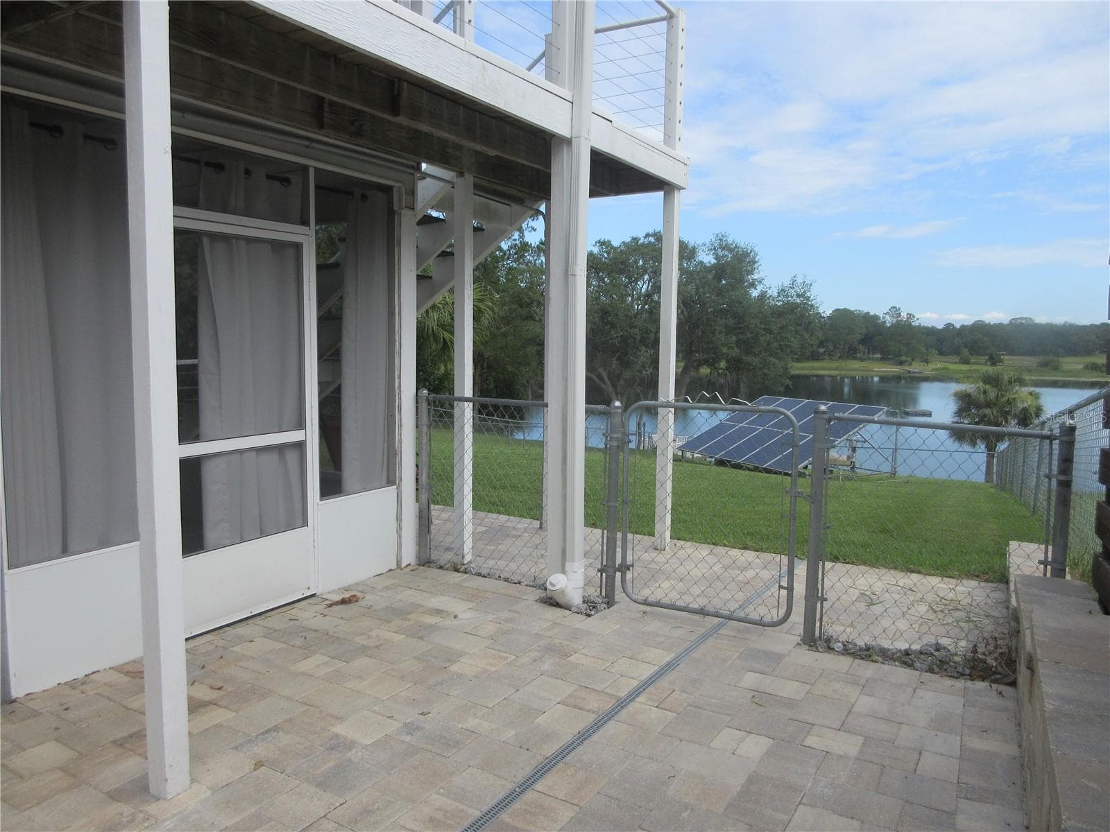 bottom story veranda entrance - 16849 SE 59TH PL, OCKLAWAHA