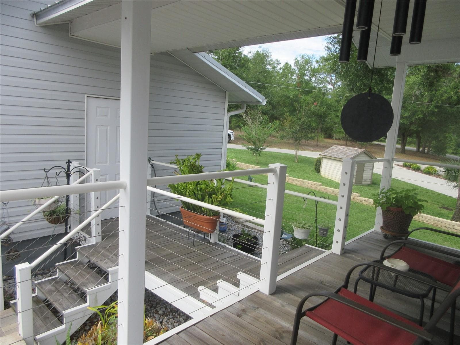 breezeway connecting to 2 car garage / bath - 16849 SE 59TH PL, OCKLAWAHA