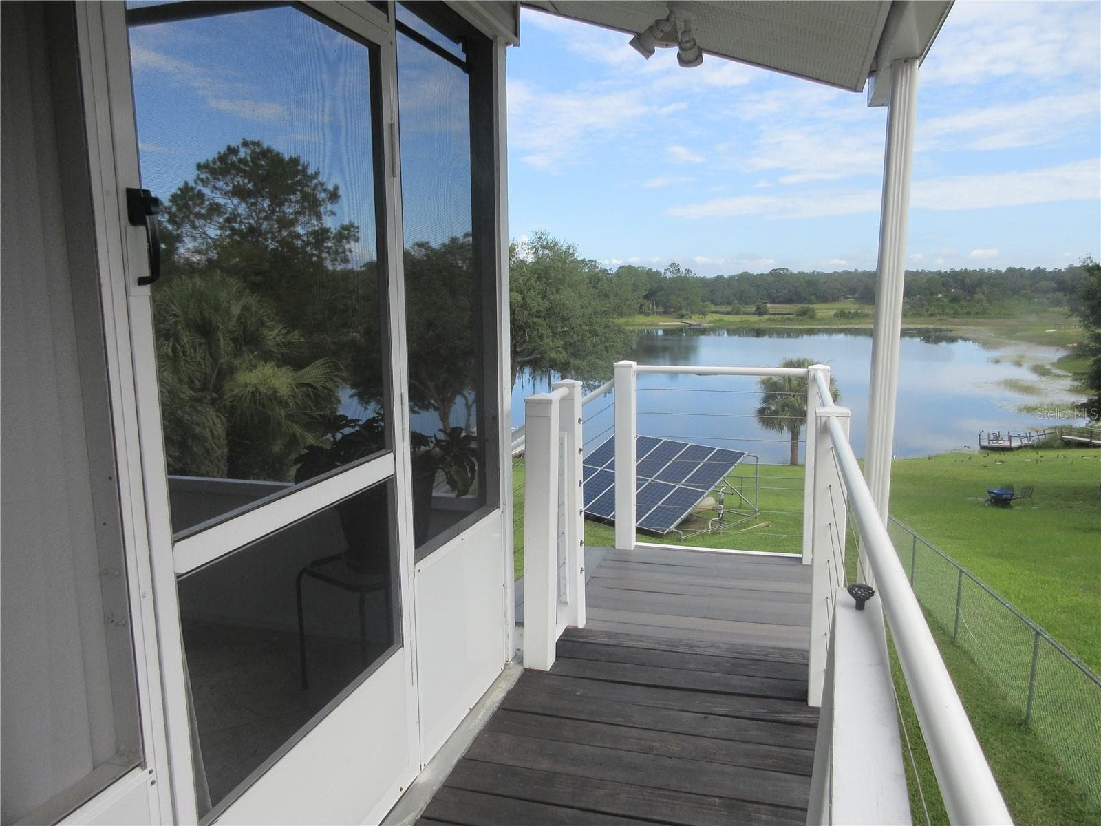 upper story veranda entrance - 16849 SE 59TH PL, OCKLAWAHA