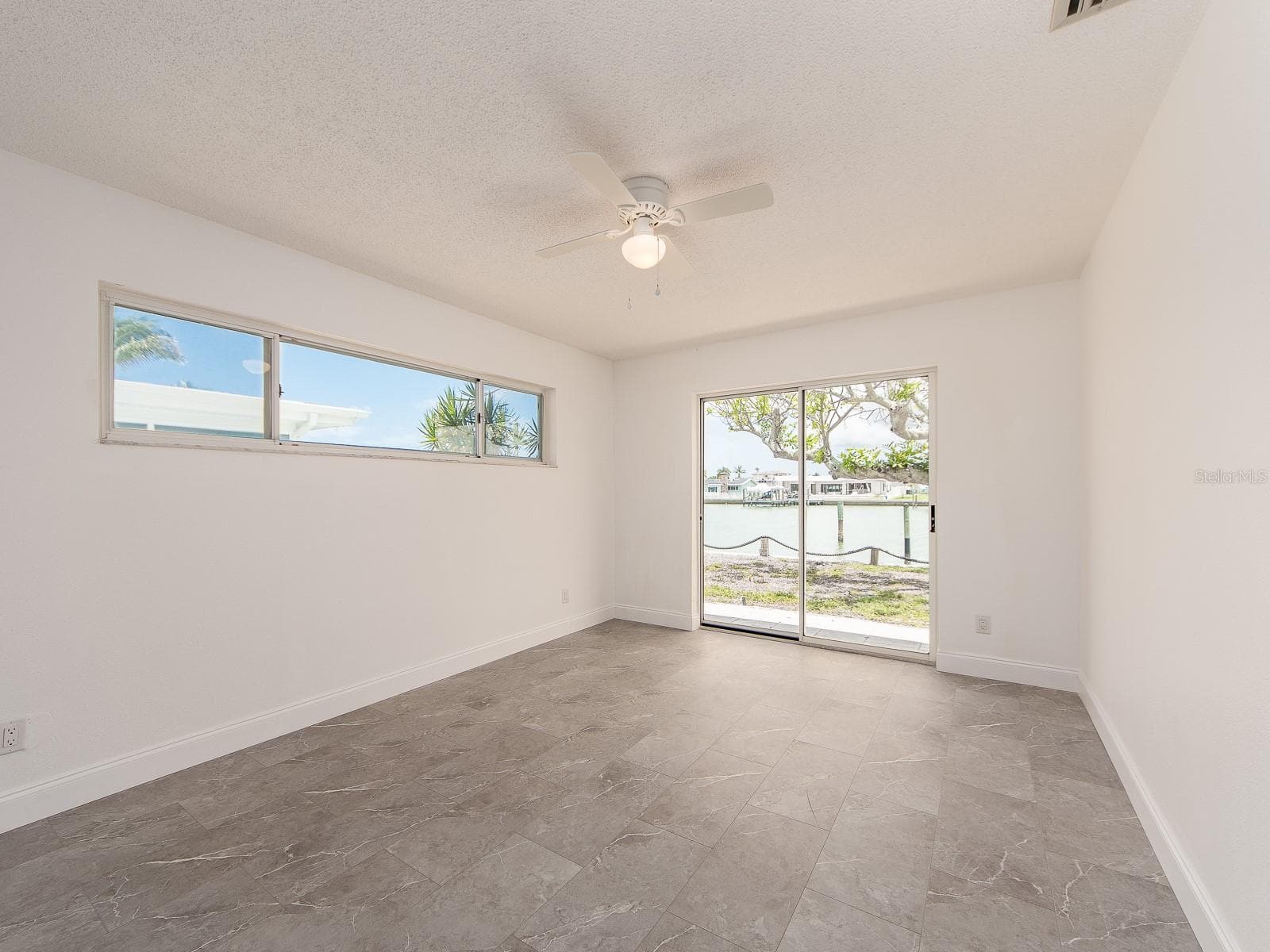 Secondary Primary with access the sliders to backyard - 720 115TH AVE, TREASURE ISLAND