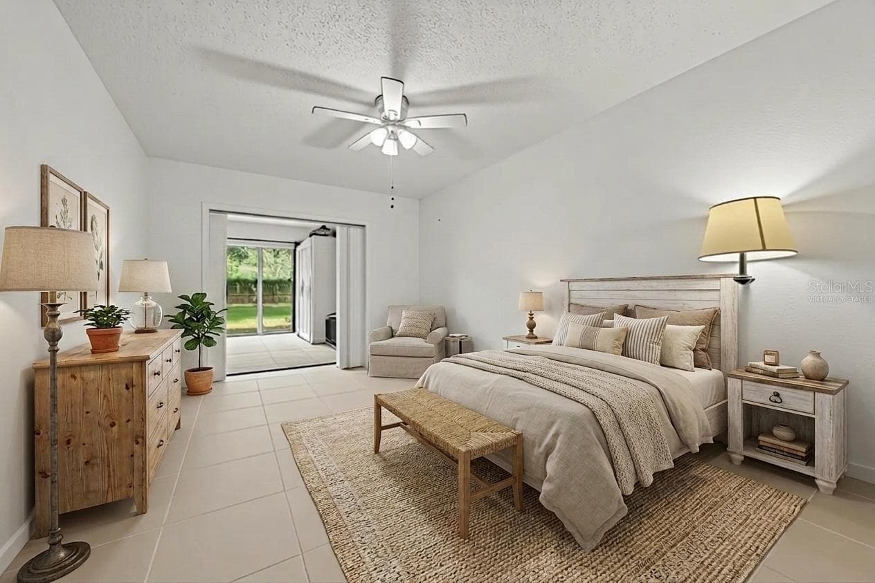Virtually staged photo. Primary Bedroom - 2008 HOUNDSLAKE DR, WINTER PARK