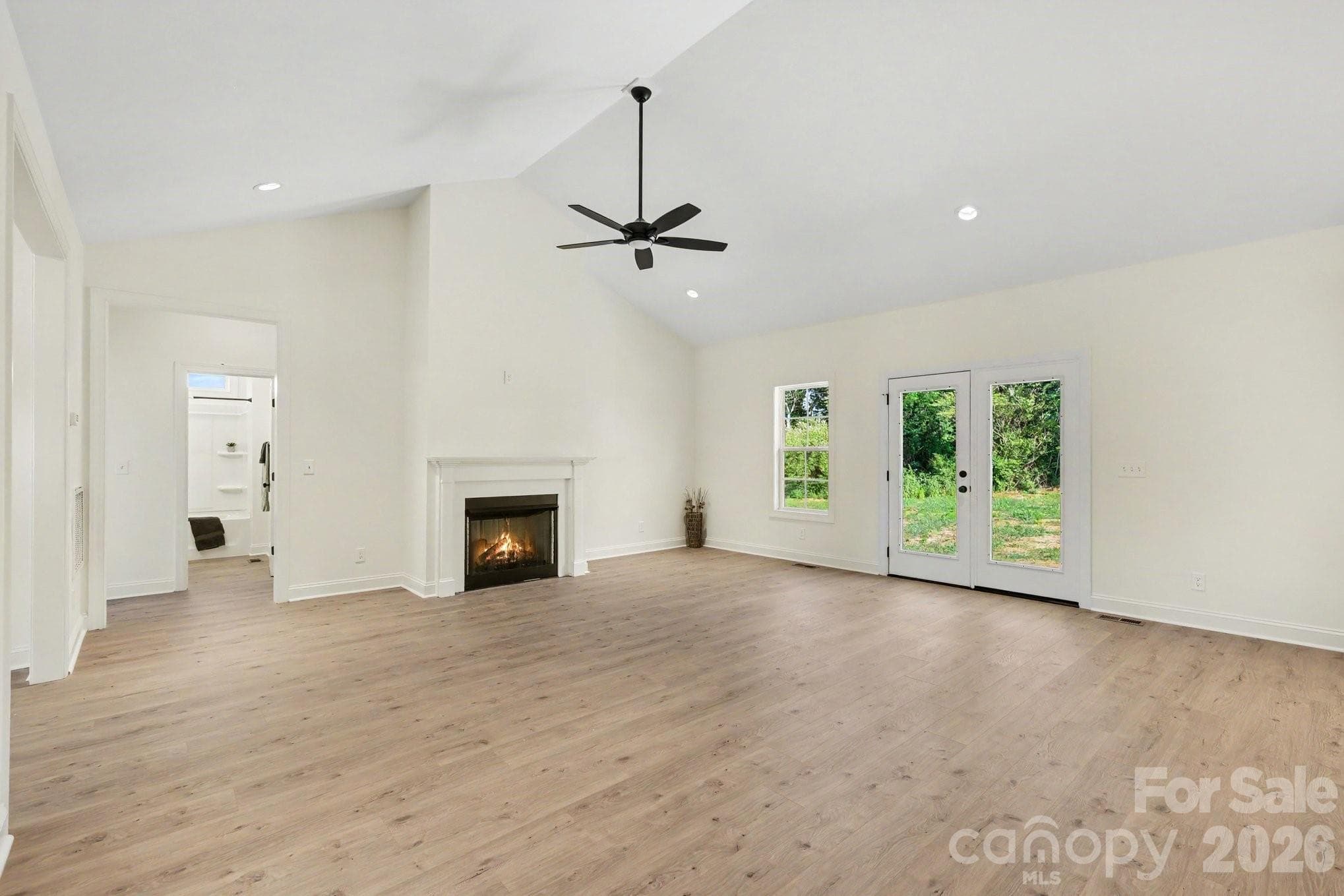 Large family room with gas log fire place - 402 Dorothy Drive, China Grove