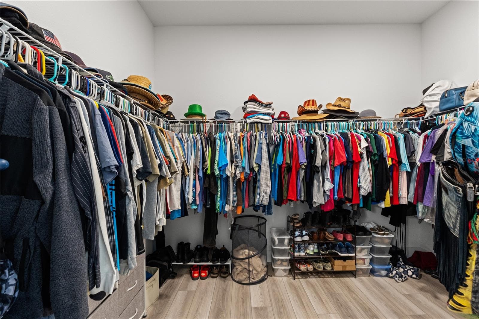 Primary walk-in closet - 11153 WOOD OWL AVE, WEEKI WACHEE