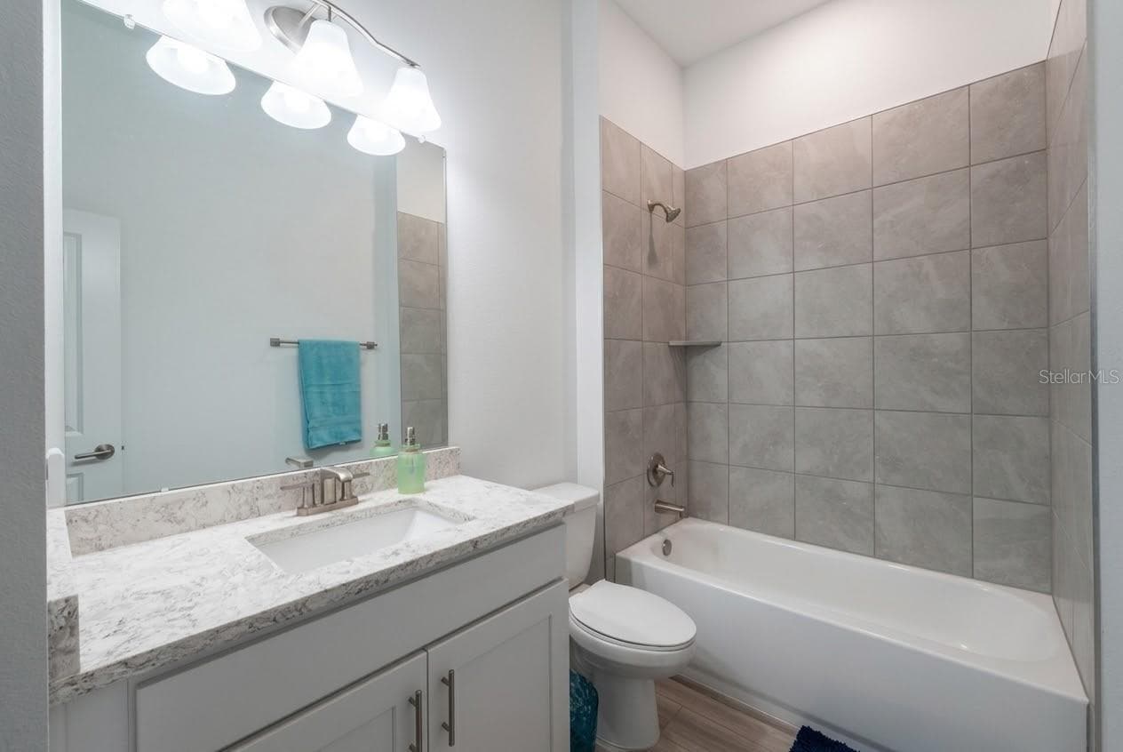 Guest bathroom - 11153 WOOD OWL AVE, WEEKI WACHEE