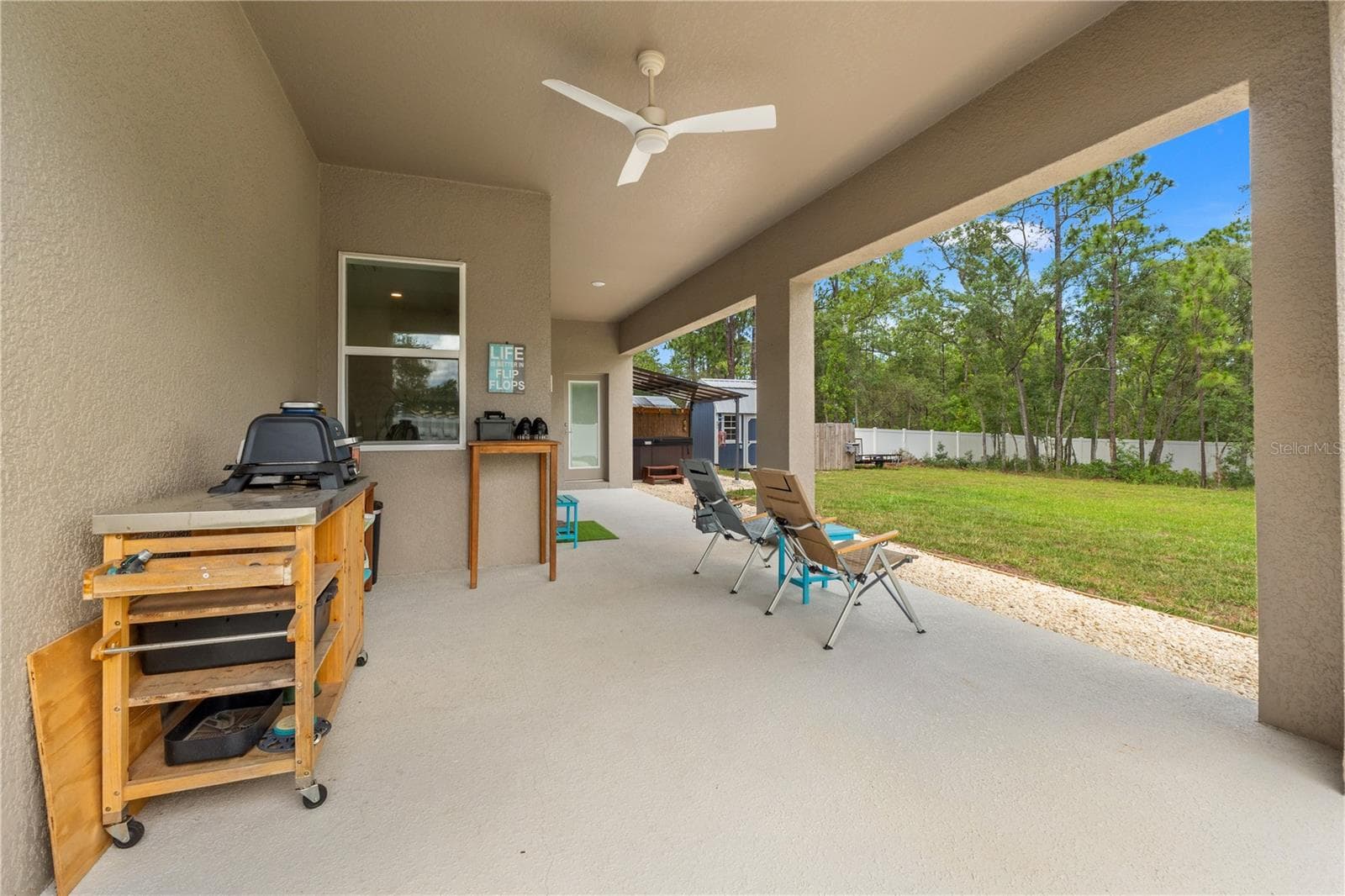 back porch - 11153 WOOD OWL AVE, WEEKI WACHEE