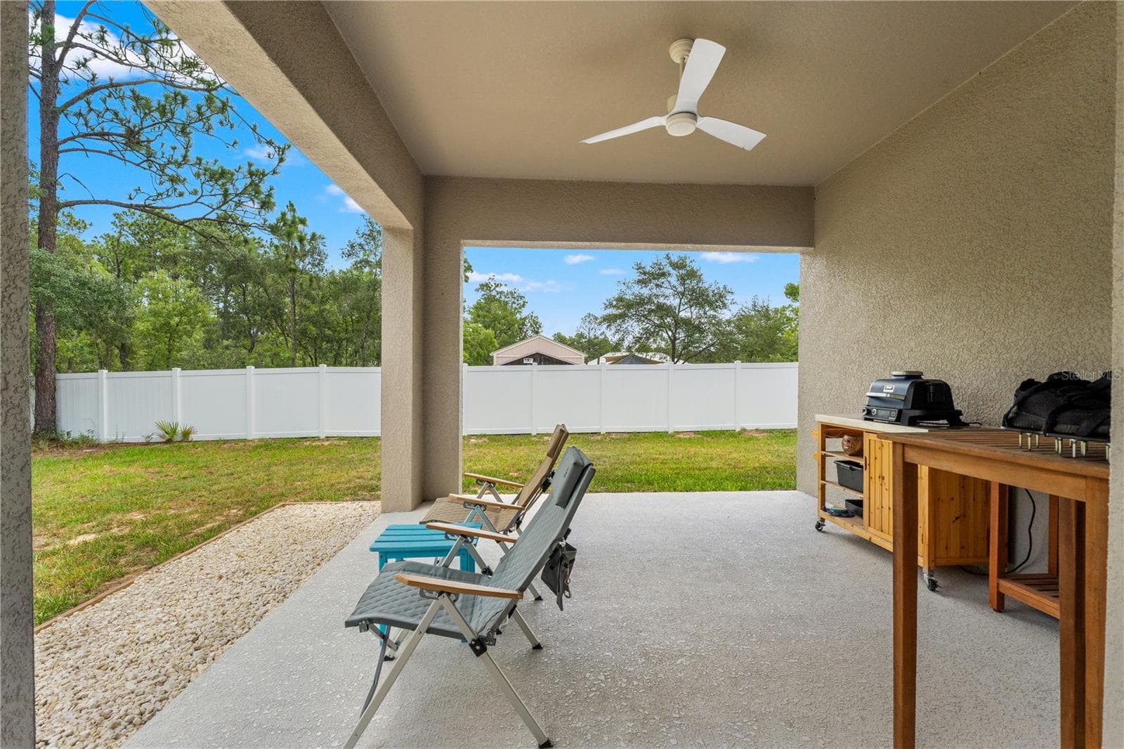 back porch - 11153 WOOD OWL AVE, WEEKI WACHEE