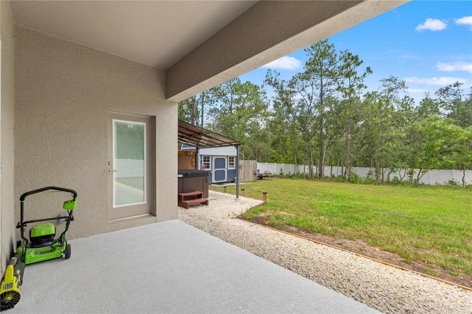 back porch - 11153 WOOD OWL AVE, WEEKI WACHEE