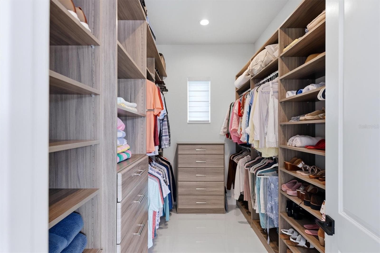 Primary Bedroom Walk-In Closet - 5931 CAT CLAW LN, BRADENTON