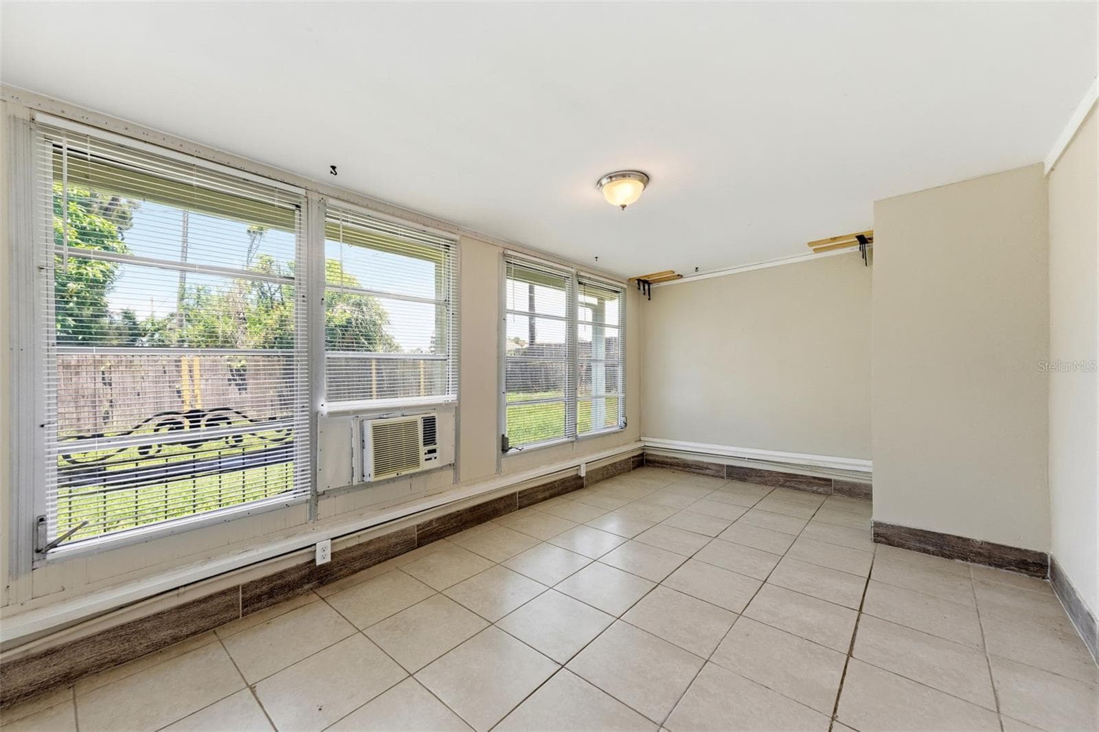 Bedroom 3. With window unit A/C and closet. - 3849 LUMA DR, HOLIDAY