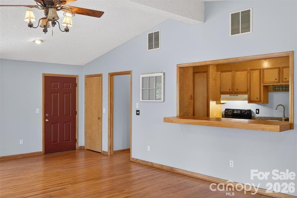 Except for kitchen & bathroom, all floors on the main level are hardwood. - Mill Spring