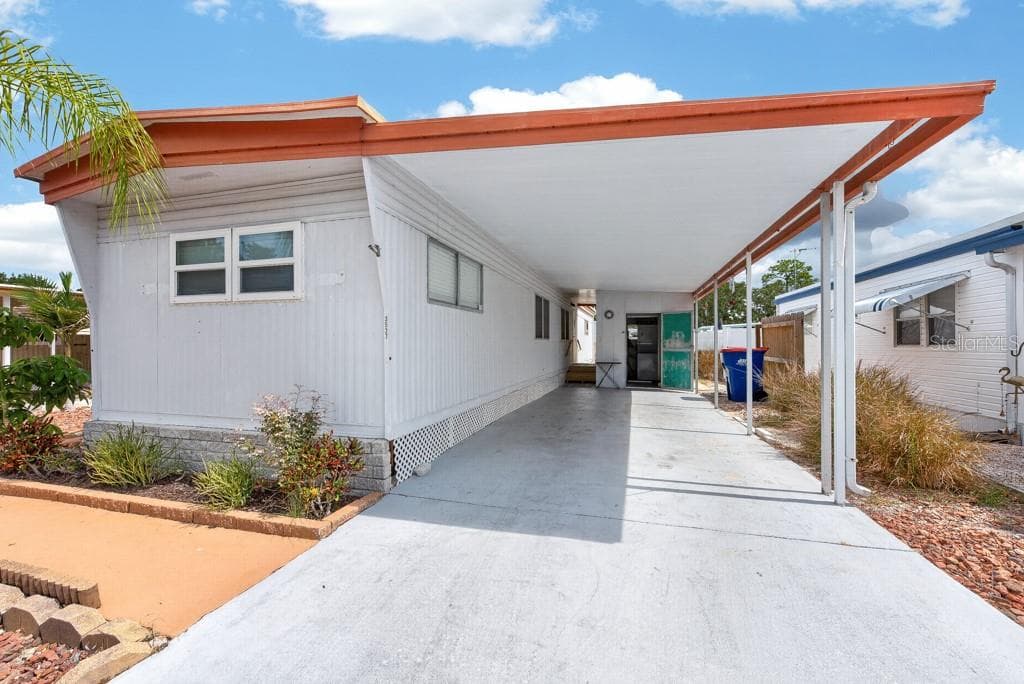 Mobile Home at 3527 TIKI DR, HOLIDAY, photo 38 of 52