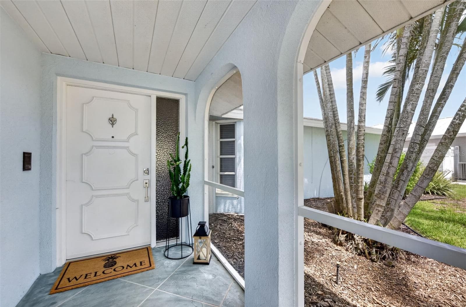 Front door with screened in entry way - 1226 PINE NEEDLE RD, VENICE