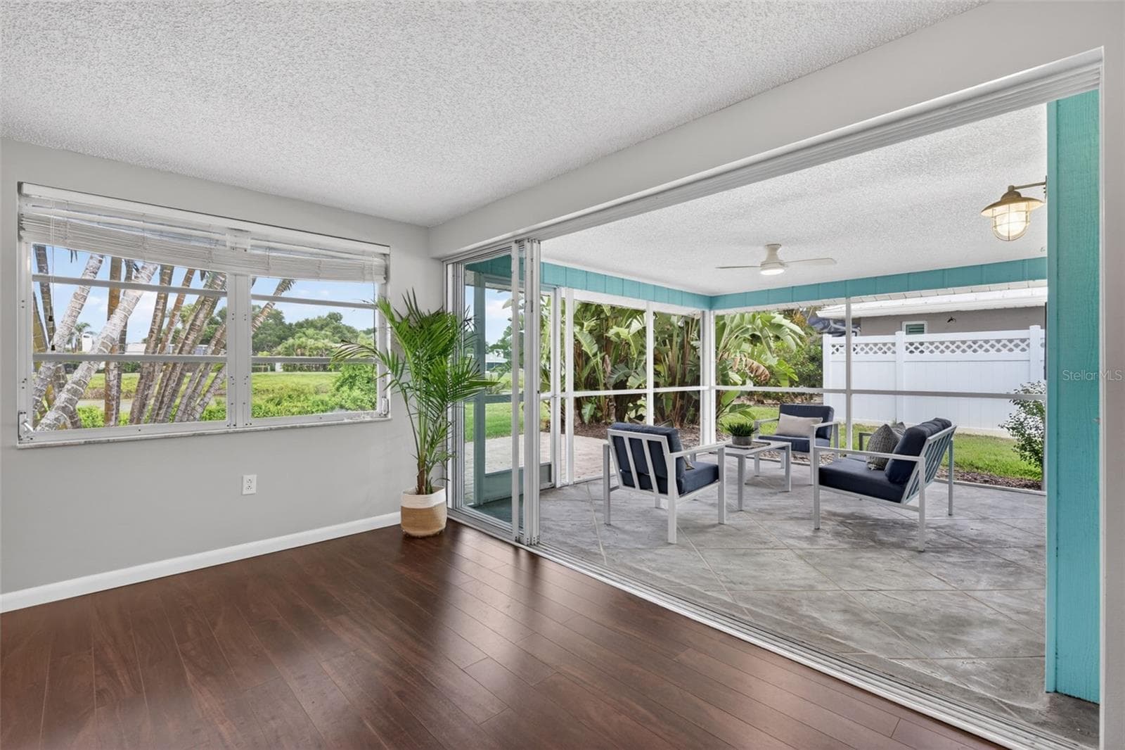 Sliding Glass Doors Lead to Lanai Overlooking Lake - 1226 PINE NEEDLE RD, VENICE