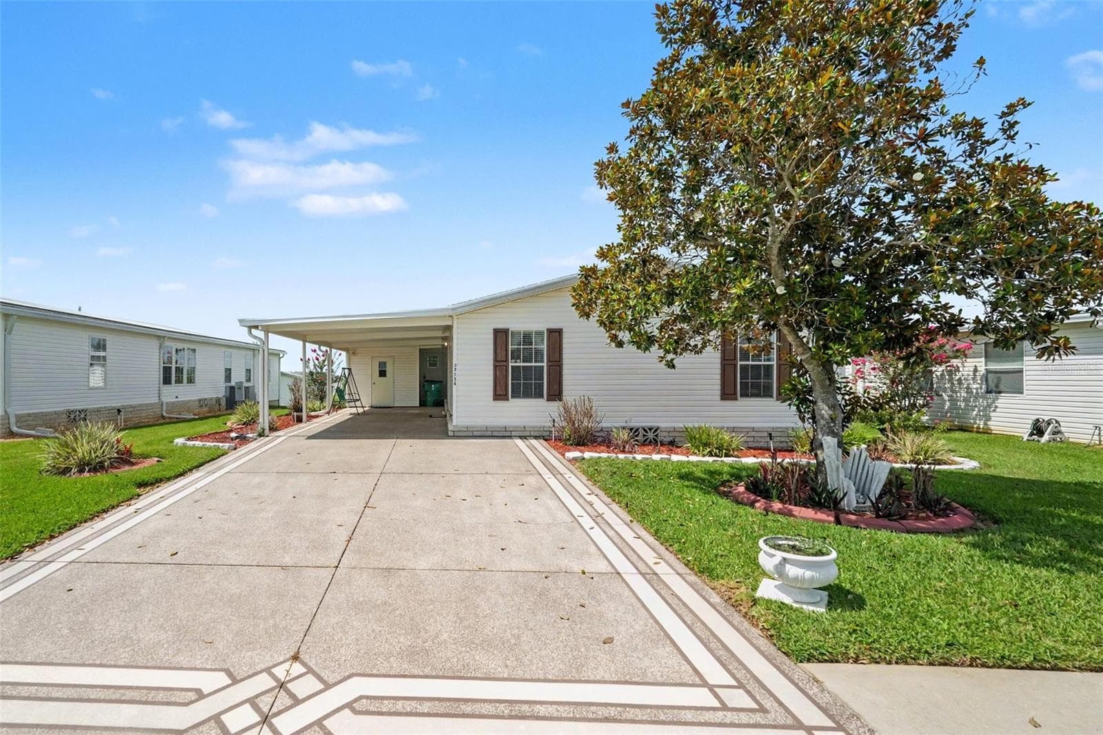 Manufactured Home at 37536 GILL AVE, ZEPHYRHILLS, photo 2 of 26