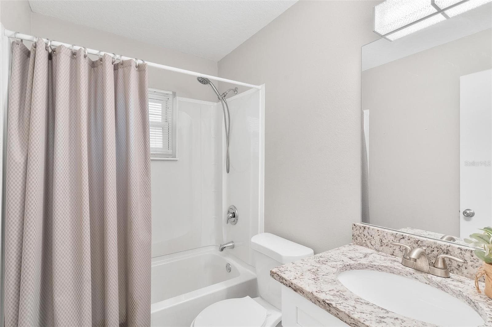 Remodeled Guest Bathroom with Tub - 35904 DAWN DR, LEESBURG