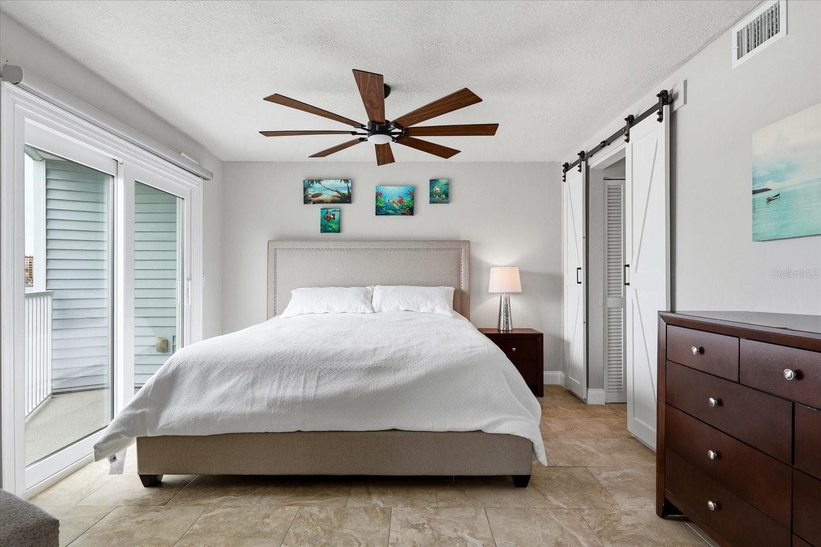 Primary bedroom with private balcony - 610 ISLAND WAY #201, CLEARWATER BEACH