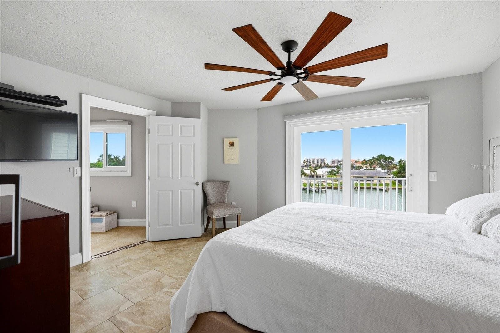 Primary bedroom with private balcony - 610 ISLAND WAY #201, CLEARWATER BEACH