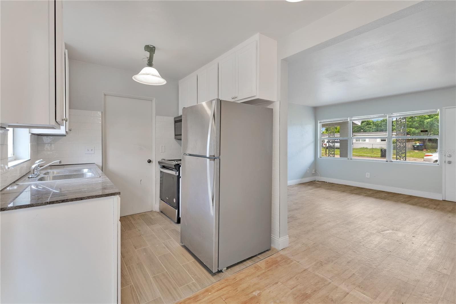 Single Family Residence at 6132 W LIVINGSTON ST, ORLANDO, photo 14 of 20