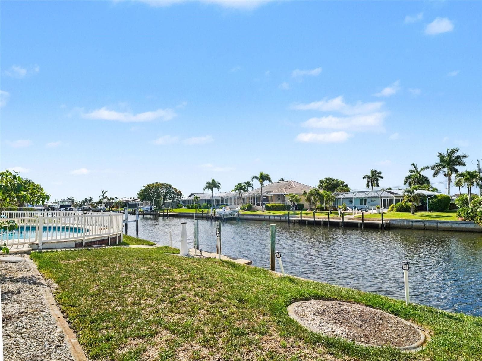 View of wide canal and dock for your boat - 548 BELVEDERE CT, PUNTA GORDA