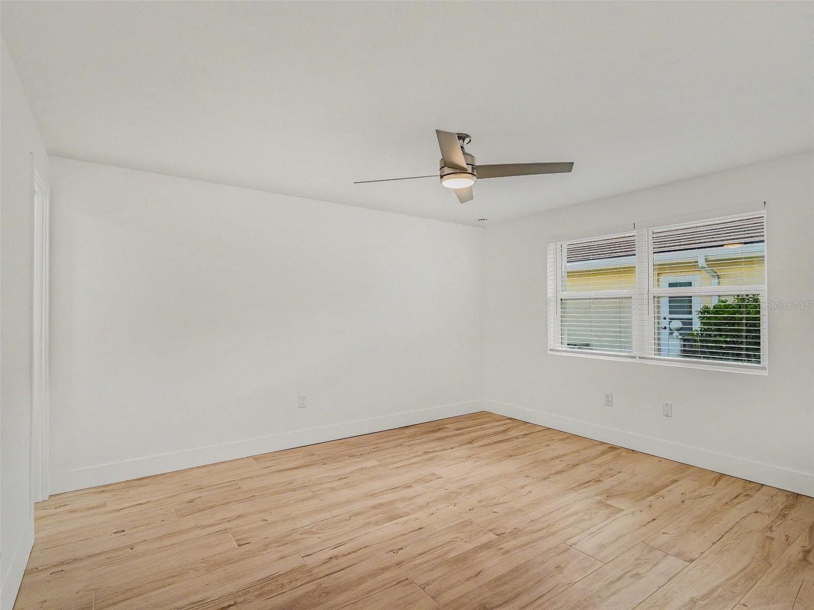 Second bedroom at front of home, 5 x 5 ft walk-in closet off to the left - 548 BELVEDERE CT, PUNTA GORDA