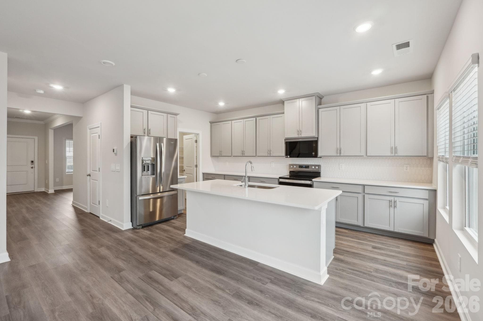 Photo is not of the actual home, but is an inspirational photo of builder’s model home and may depict options, furnishings, and/or decorator features that are not included - Stanley