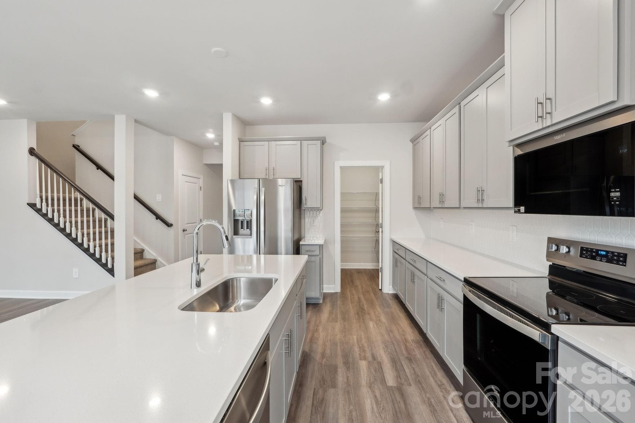 Photo is not of the actual home, but is an inspirational photo of builder’s model home and may depict options, furnishings, and/or decorator features that are not included - Stanley