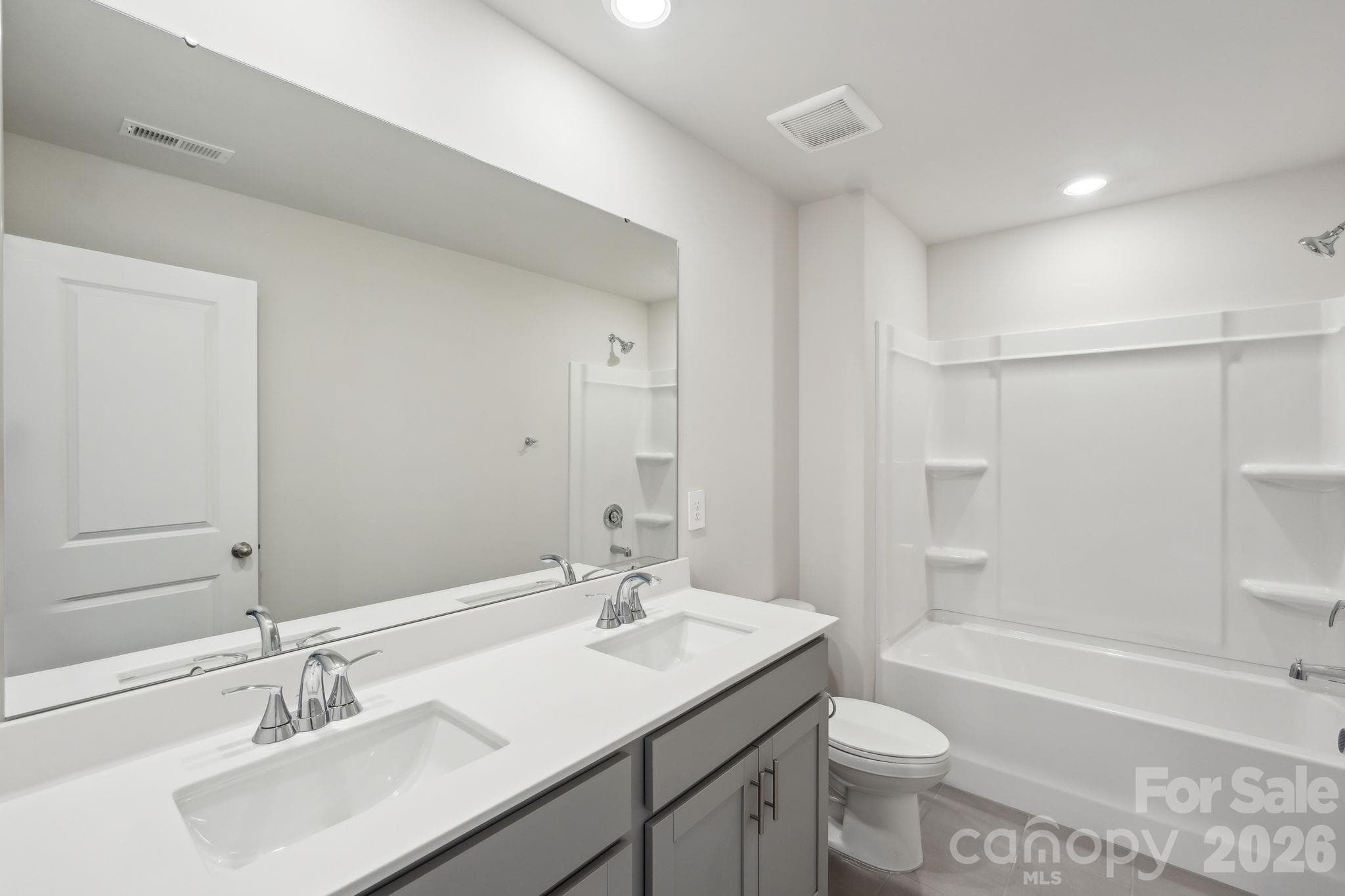 Photo is not of the actual home, but is an inspirational photo of builder’s model home and may depict options, furnishings, and/or decorator features that are not included - Stanley