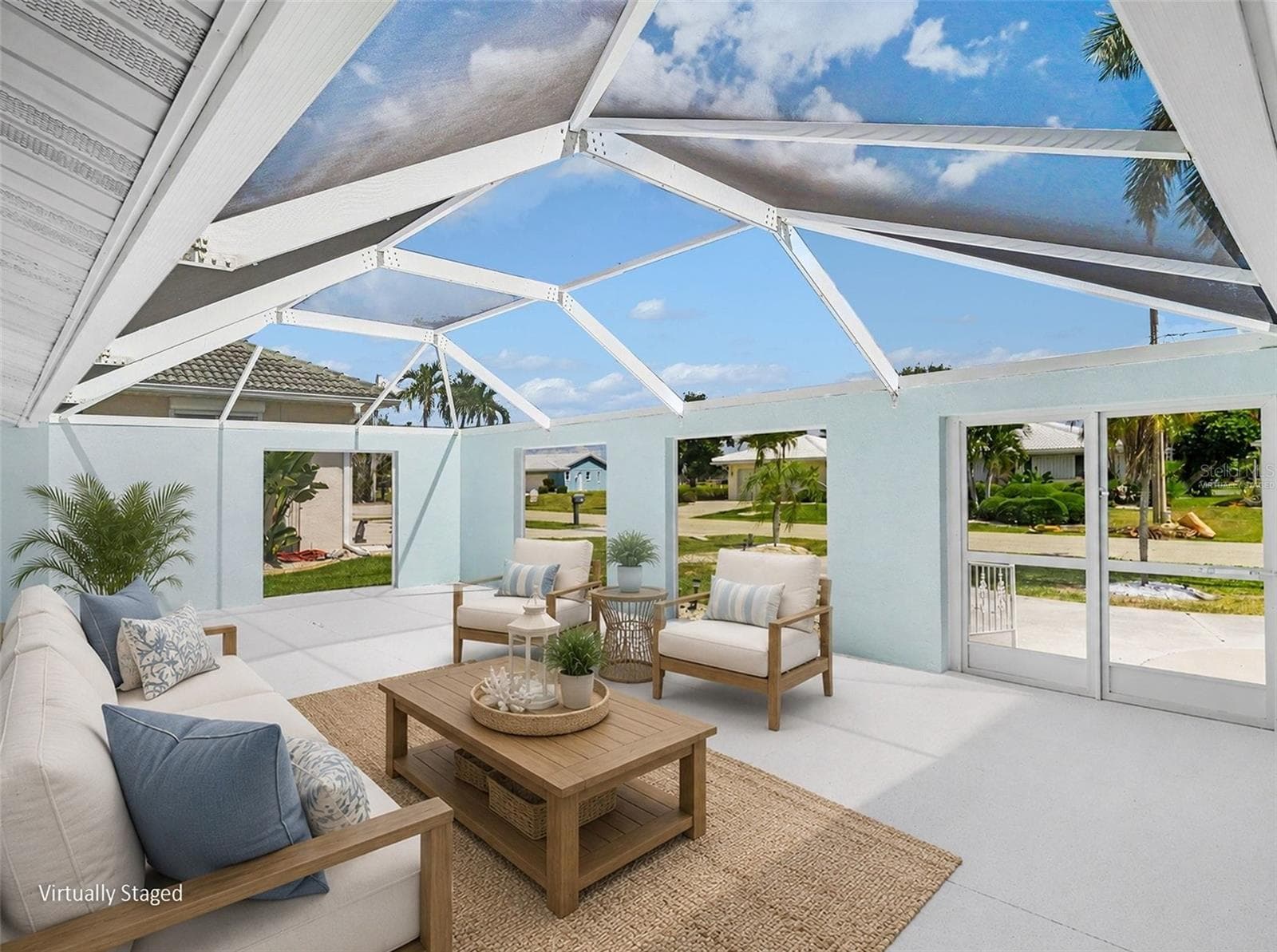 Spacious front courtyard with lots of Florida charm - extend your living space even more! (virtually staged) - 548 BELVEDERE CT, PUNTA GORDA