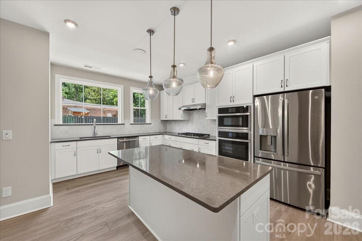 Gourmet kitchen with appliances - Waxhaw