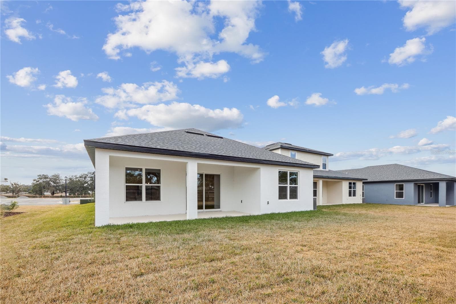 PHOTOS OF SAME MODEL WITH SIMILIAR FINISHES - 86 SPRINGWOOD DR, PALM COAST