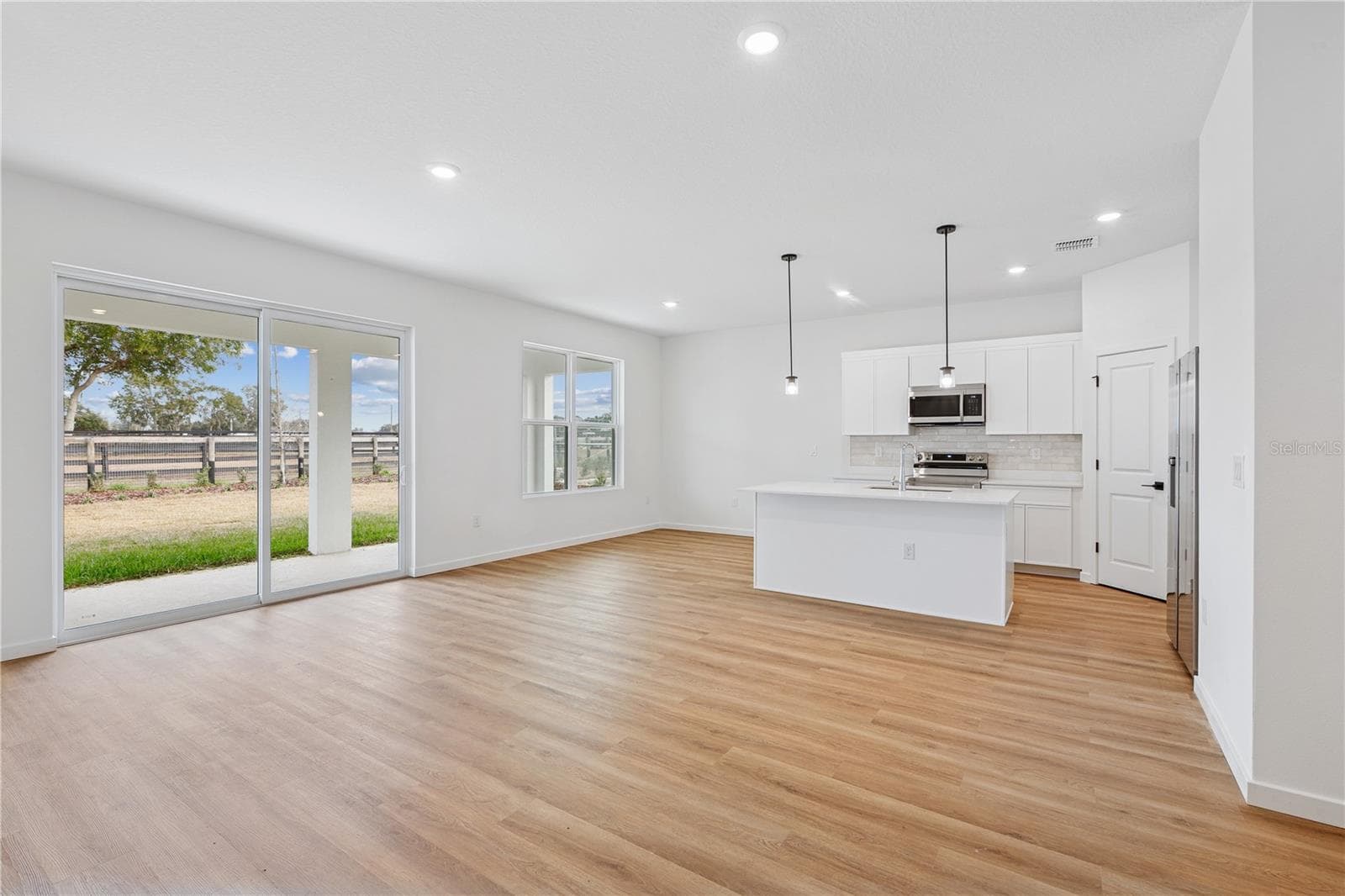 PHOTOS OF SAME MODEL WITH SIMILIAR FINISHES - 86 SPRINGWOOD DR, PALM COAST