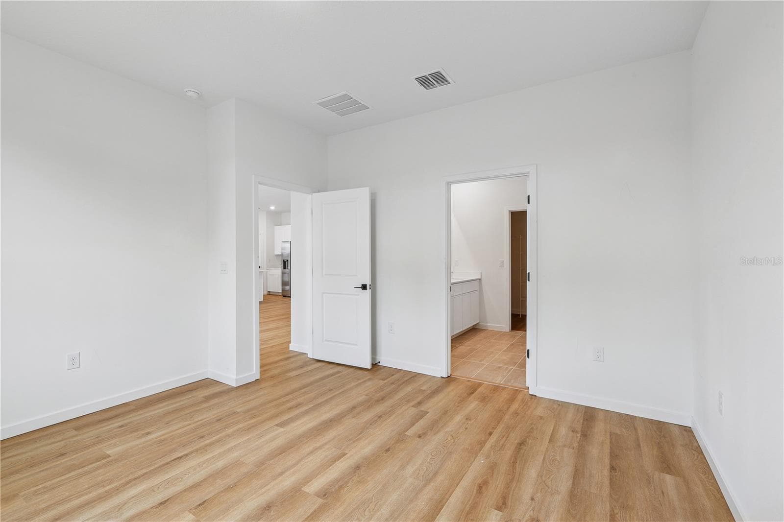 PHOTOS OF SAME MODEL WITH SIMILIAR FINISHES - 86 SPRINGWOOD DR, PALM COAST