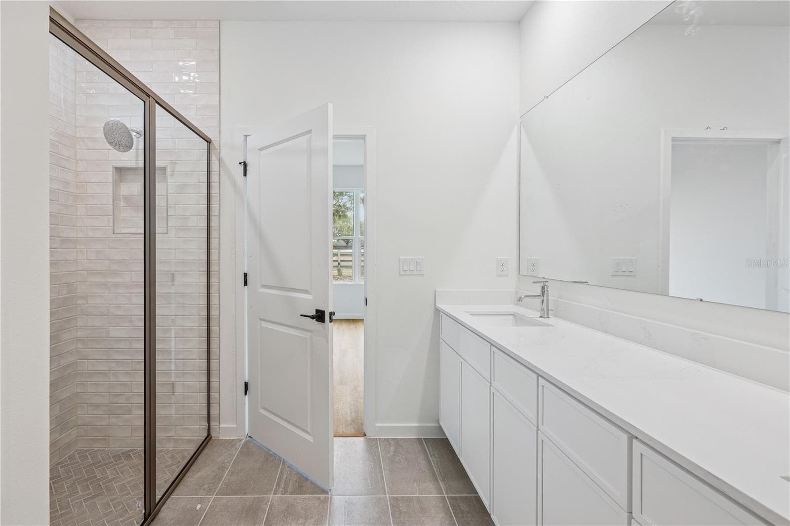 PHOTOS OF SAME MODEL WITH SIMILIAR FINISHES - 86 SPRINGWOOD DR, PALM COAST