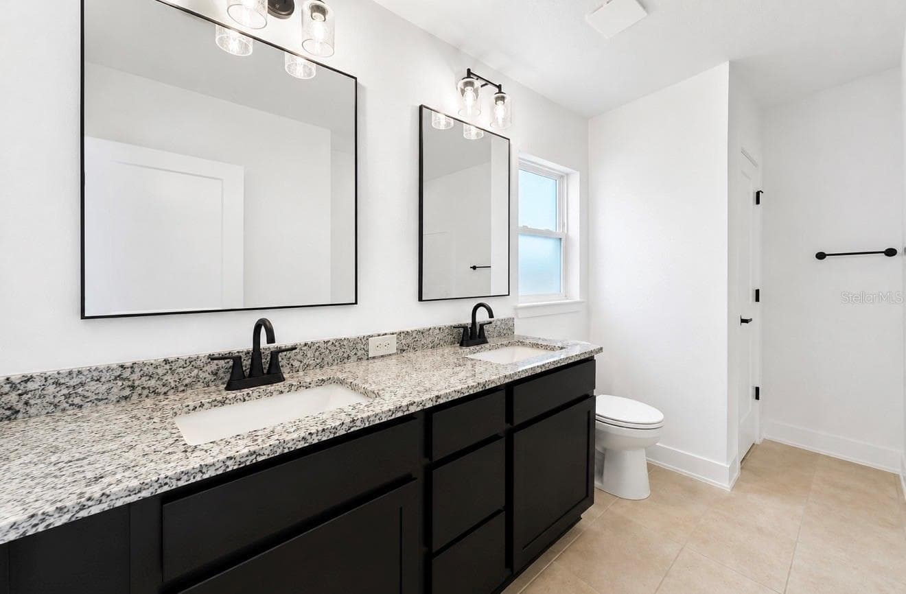 Bathroom with Double Vanity - 7612 BENT TREE LOOP, ST CLOUD