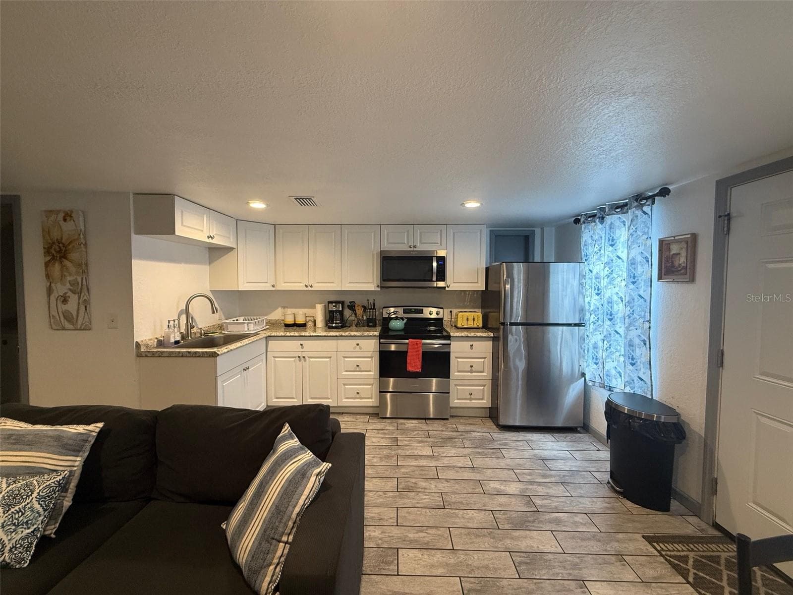 907 Wabash living-kitchen - 907 N WABASH AVE, LAKELAND