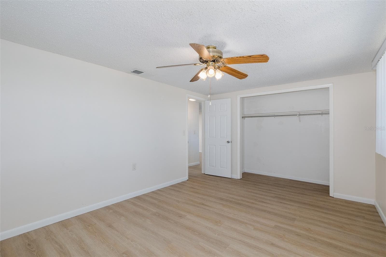 Primary Bedroom - 1148 FERNWOOD DR, HOLIDAY