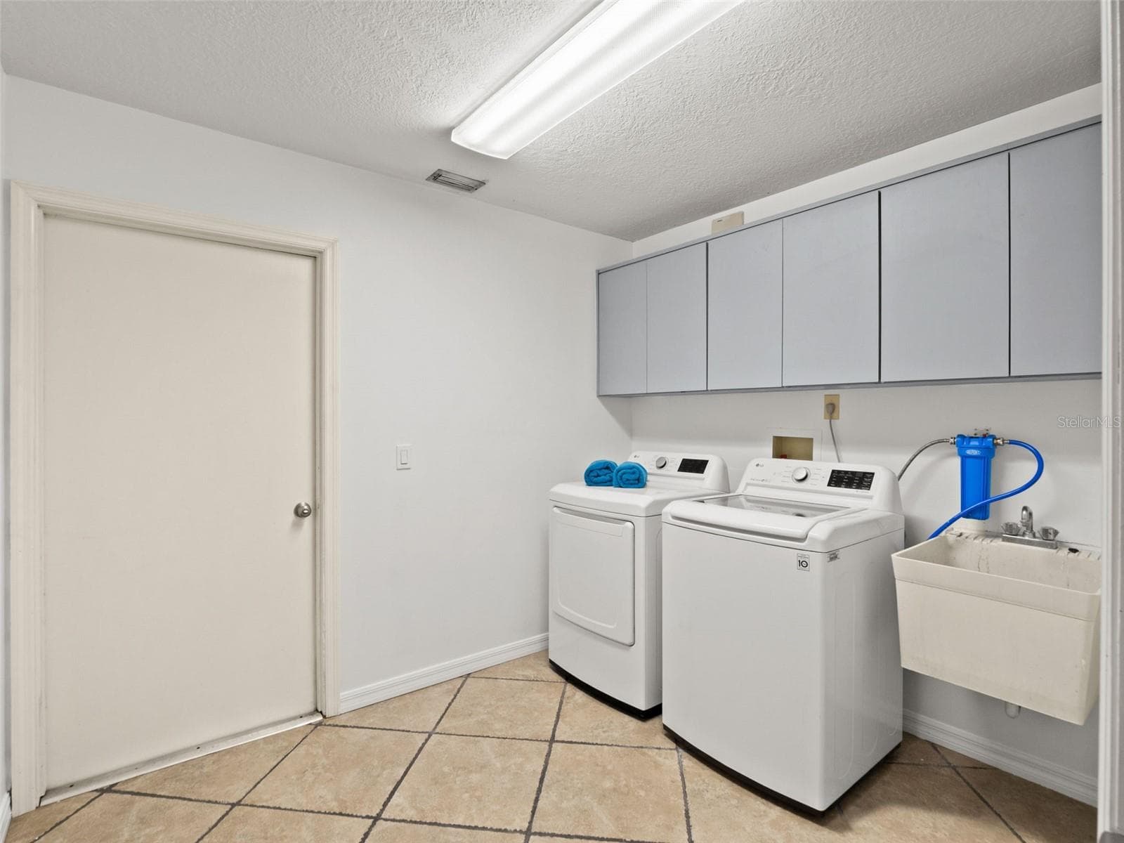 Laundry Room with Additional Storage - 3501 HILL STREAM AVE, APOPKA