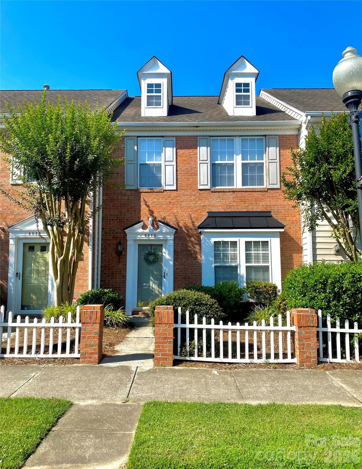 Second unit on left from the end of 6 townhomes connected. - Indian Trail