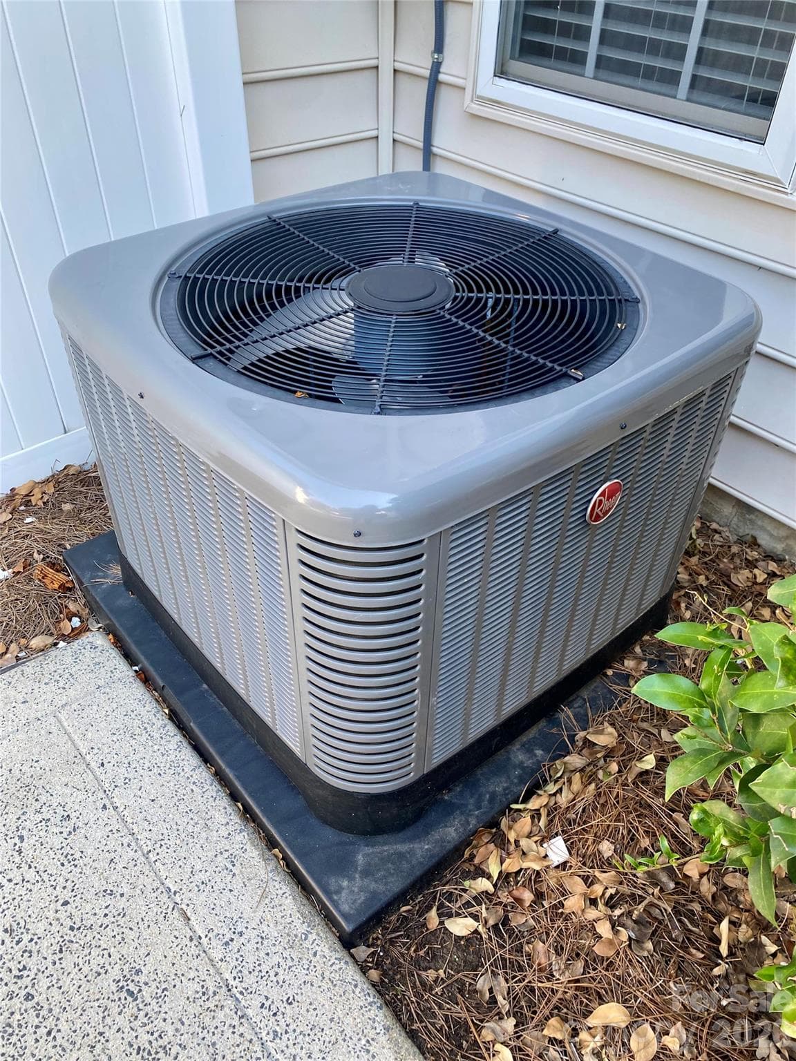 New, permitted HVAC unit 2024. Gas forced air. Rheem Condensing Unit located behind the townhome off patio. - 6025 Creft Circle, Indian Trail