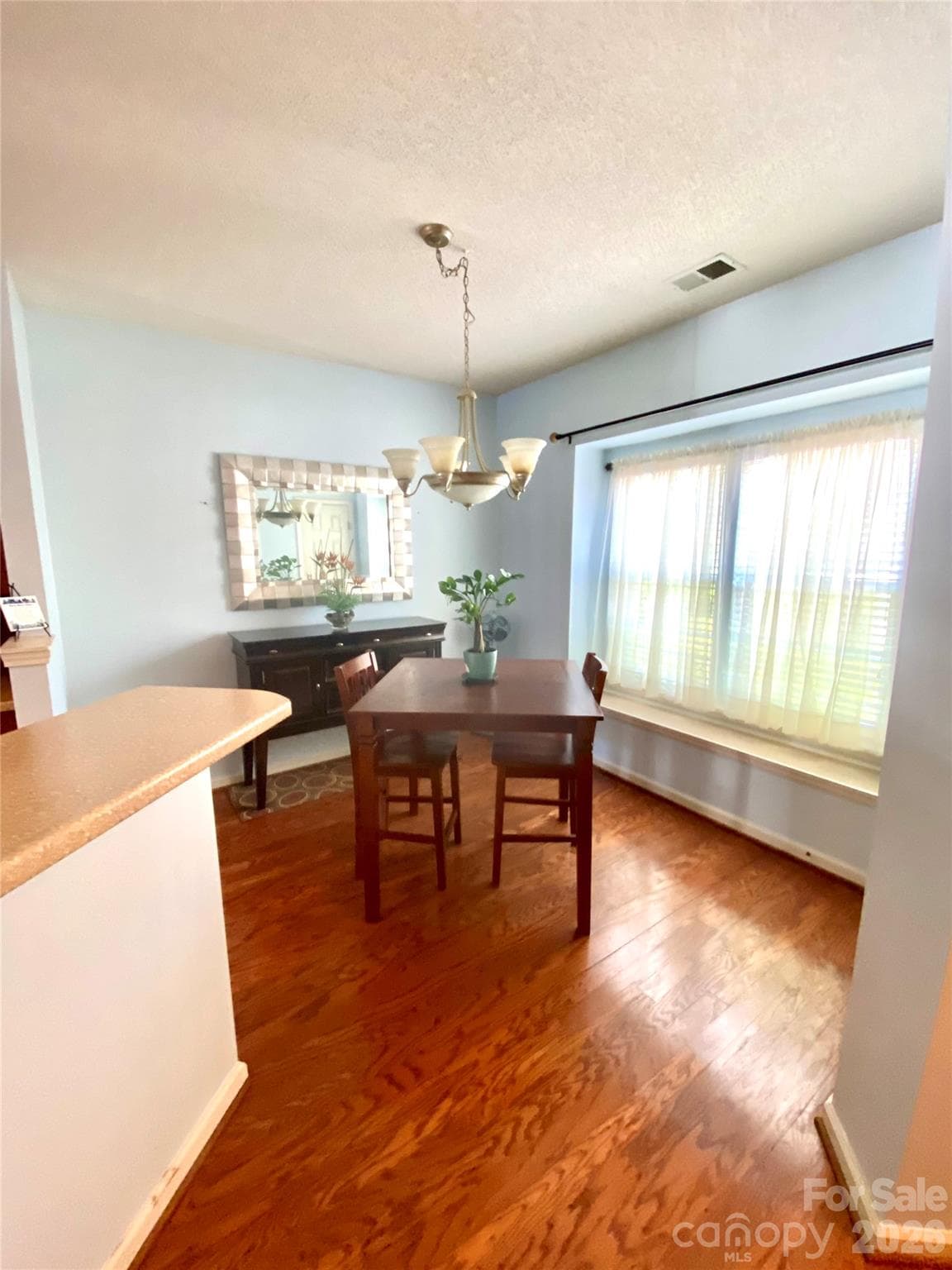 Dining Room with lots of lighting from the front of the townhome. - 6025 Creft Circle, Indian Trail