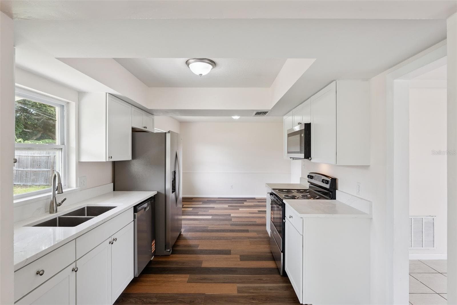 Kitchen View to Dining Room - 1605 PURITAN AVE, WINTER PARK
