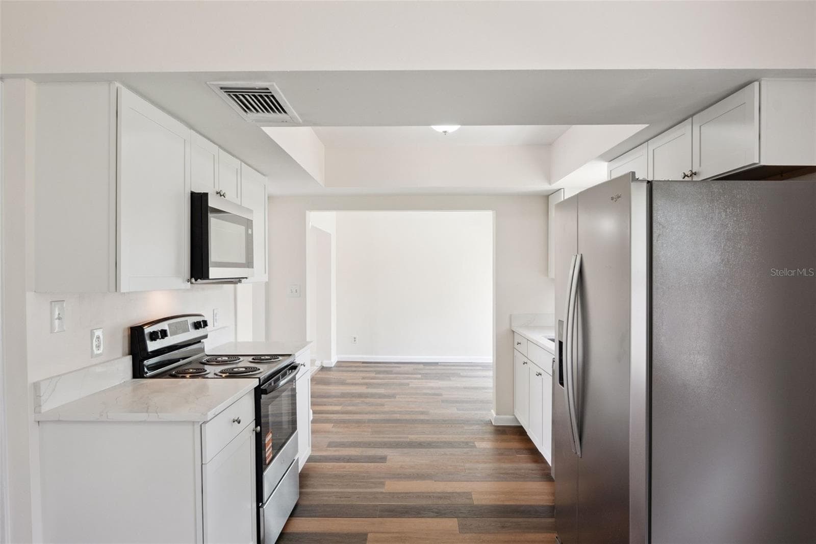 Kitchen View to Flex Space - 1605 PURITAN AVE, WINTER PARK