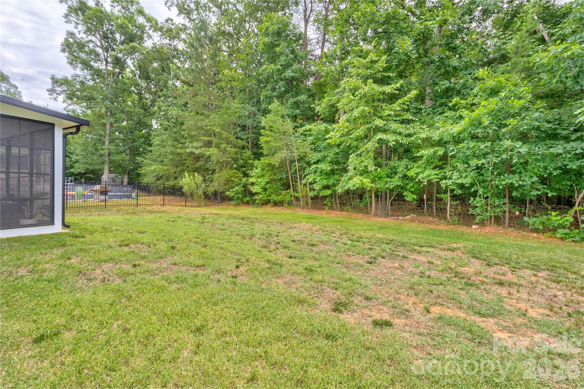 The original phase of Oakview Commons has mature trees and this lot backs up to a view of GREEN. - 317 Oak Brook Drive, Salisbury
