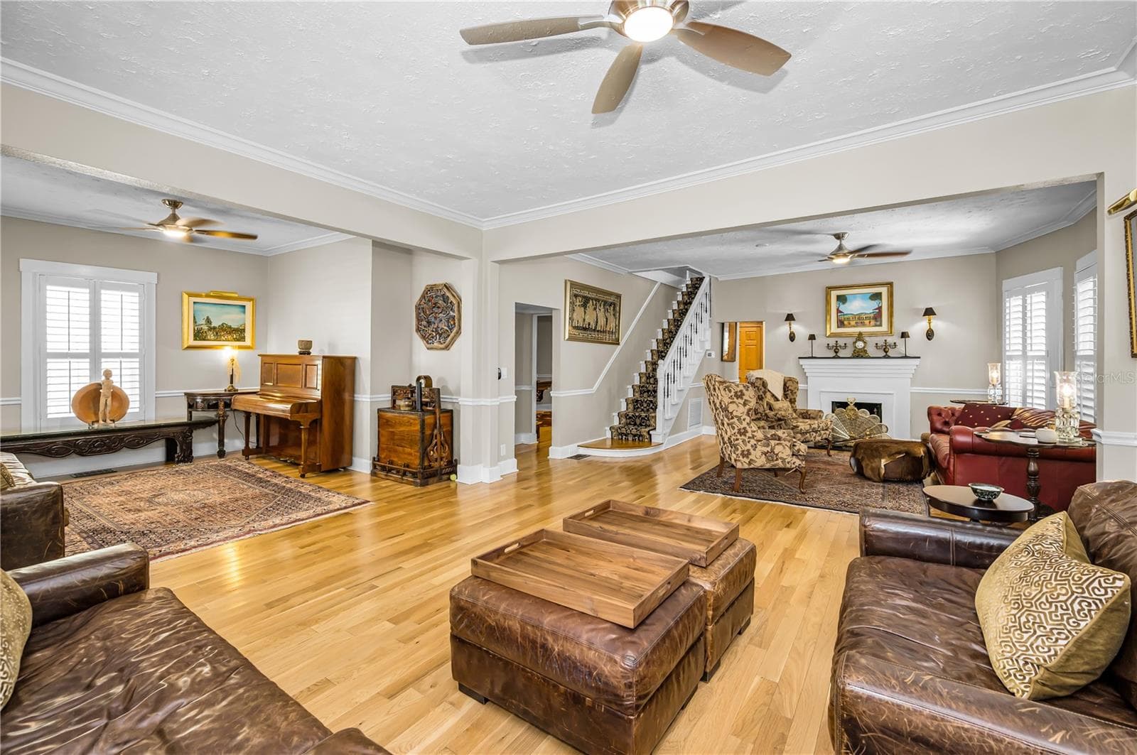 Additional section of the Great room with view of staircase #1 - 732 NE OAK ST, ST PETERSBURG