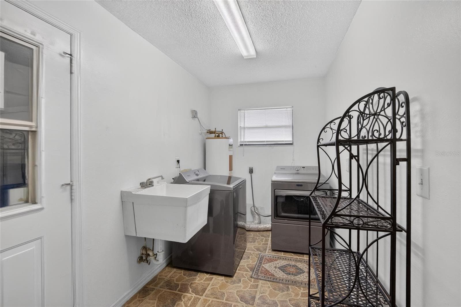inside laundry room - 3708 JOE SANCHEZ RD, PLANT CITY