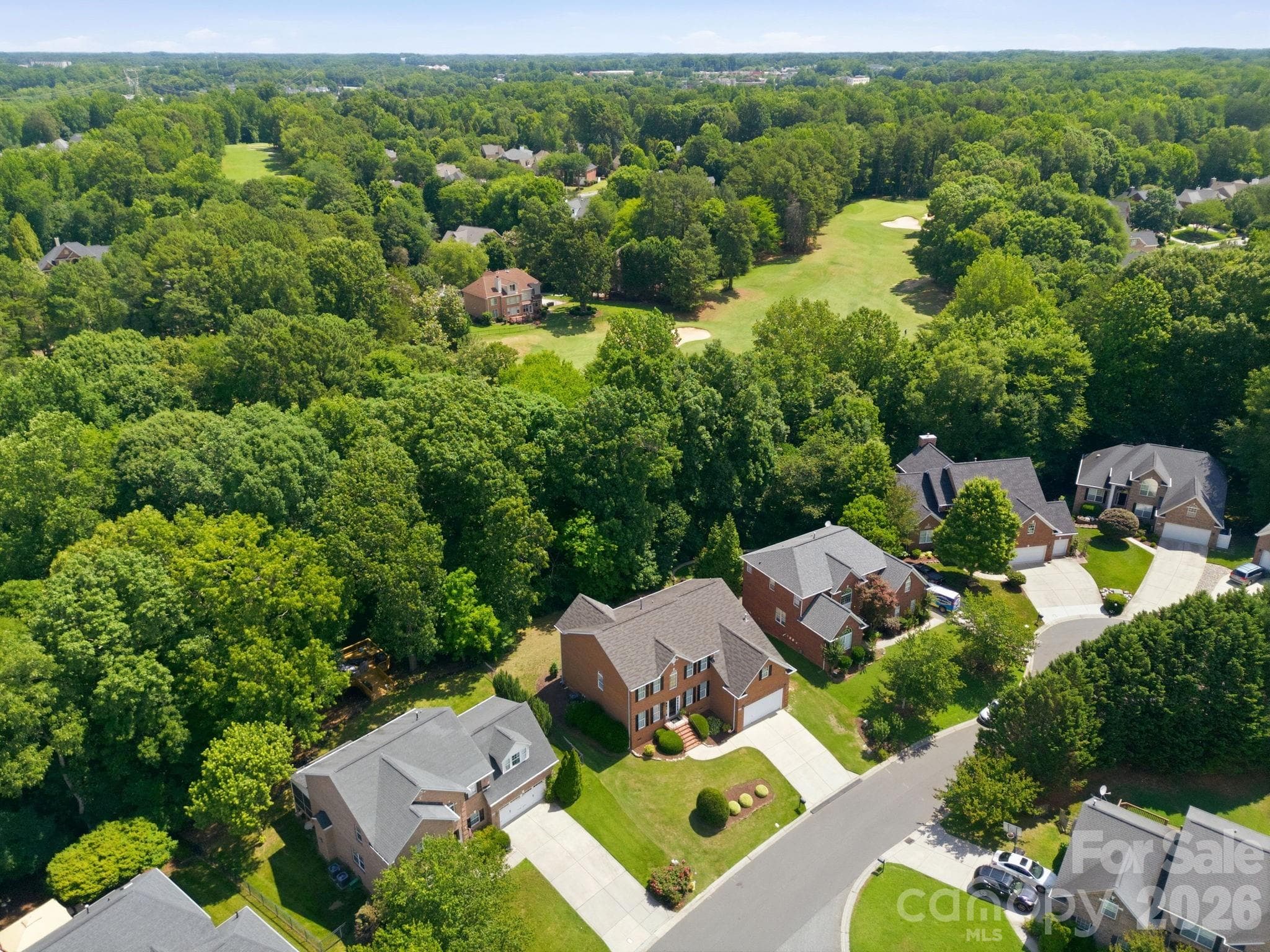 aerial view showcasing the neighborhood public golf course - Huntersville
