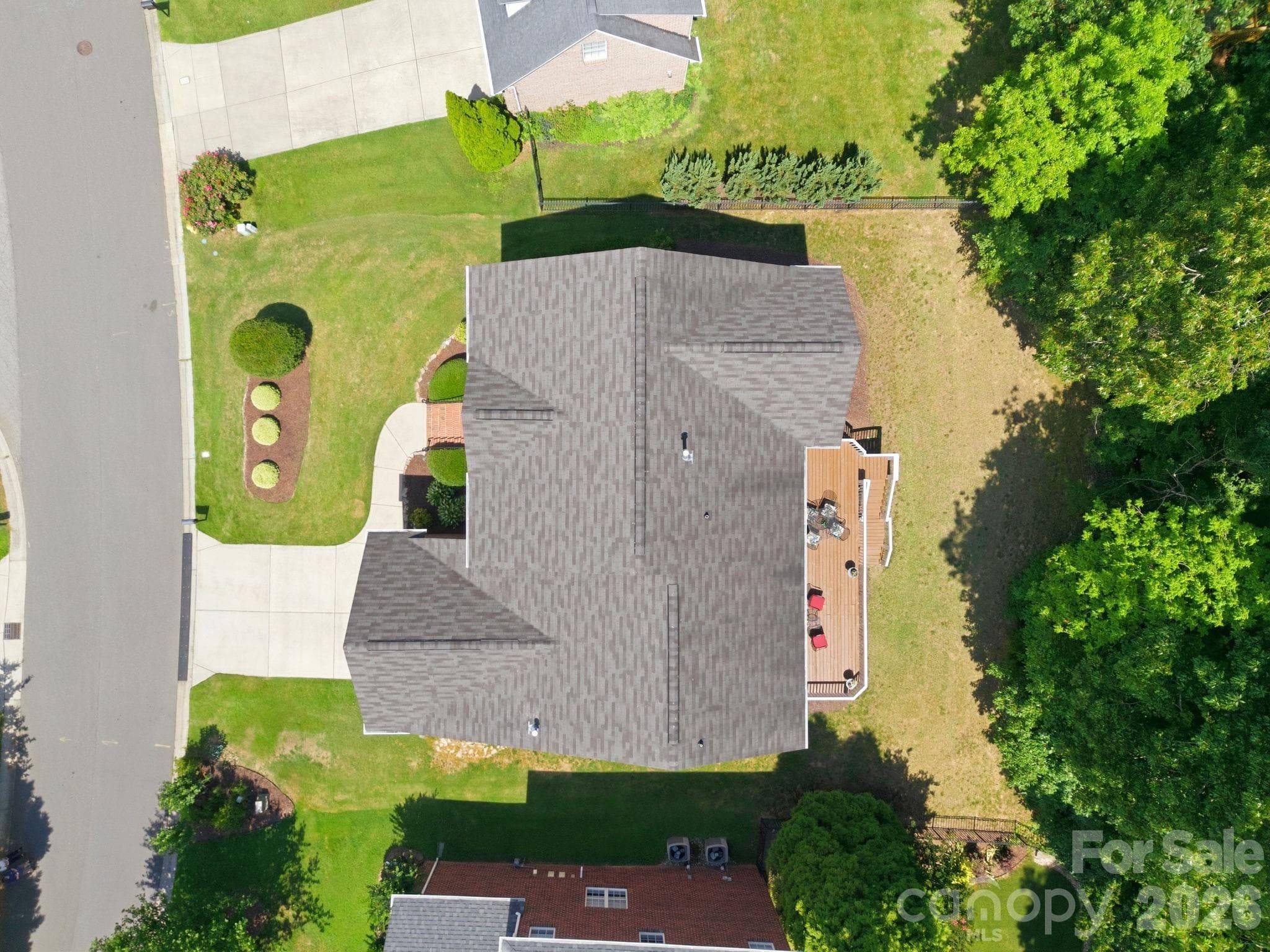 Aerial view showcasing the private backyard - Huntersville