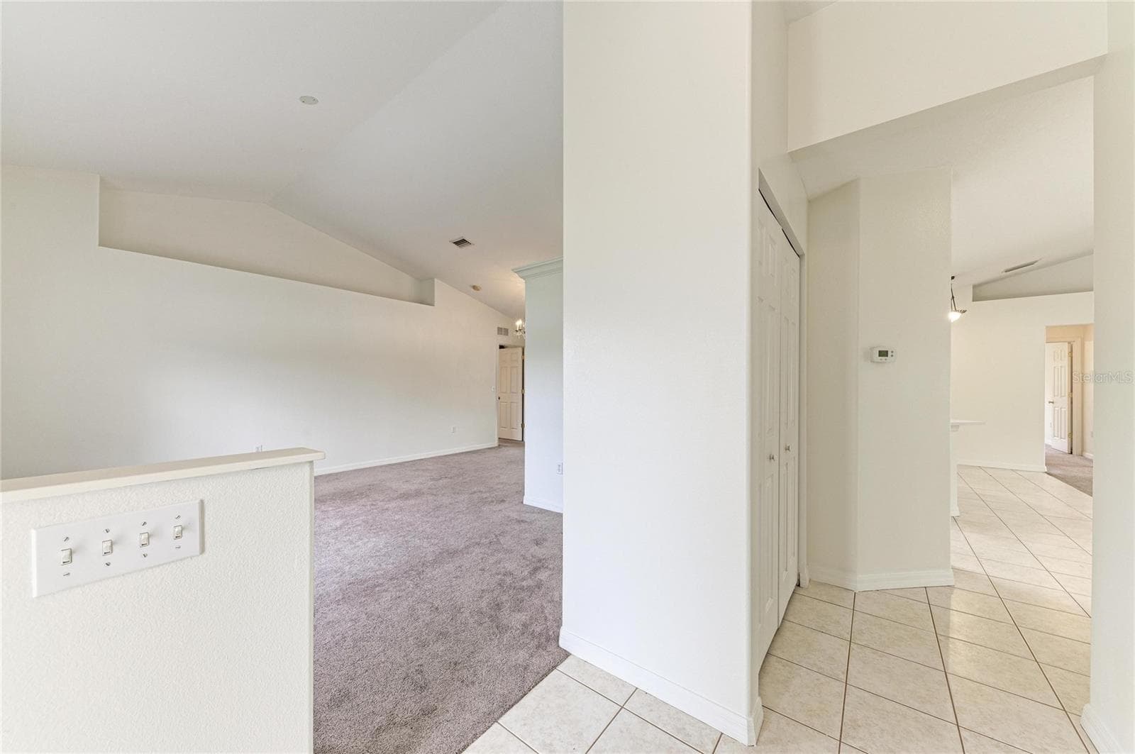 Foyer opens to living room to left and family room to right - 3213 45TH AVE E, BRADENTON