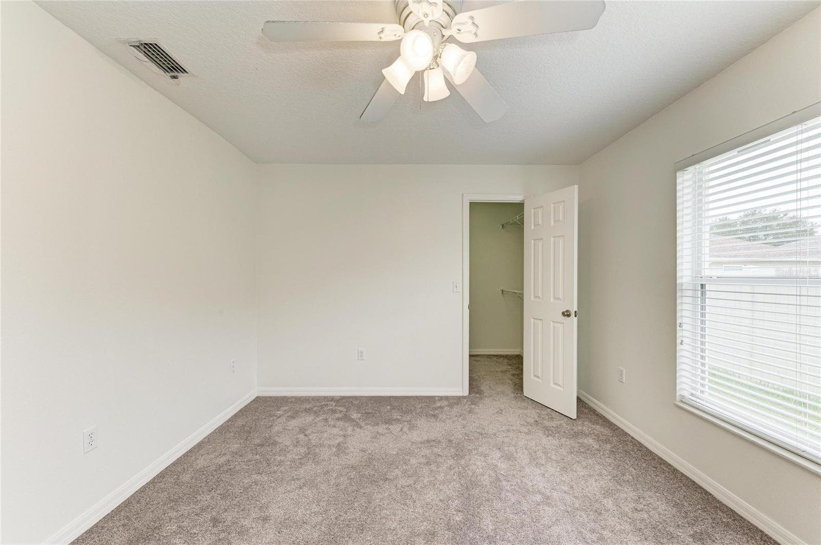 Bedroom 2 with walk-in closet - 3213 45TH AVE E, BRADENTON