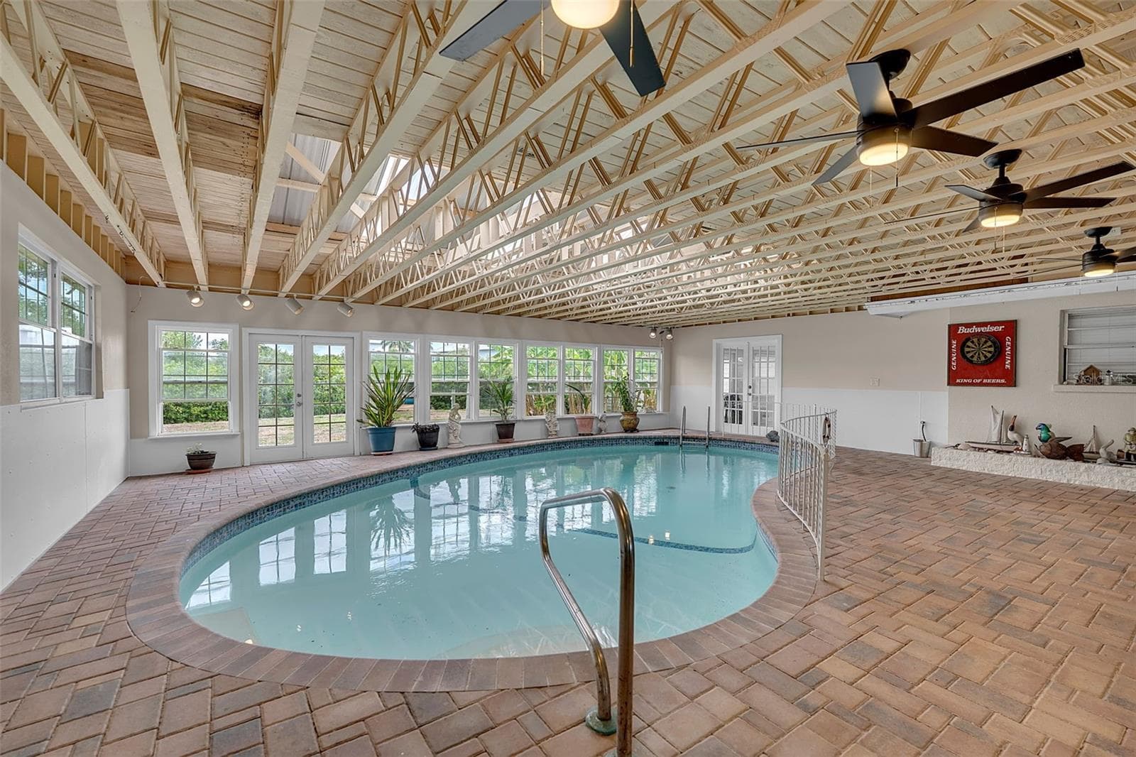 Rain or Shine enjoy a swim or entertain guest after a day on the boat poolside. Surrounded by pavers and tons of windows. - 332 SHORE DR, ELLENTON